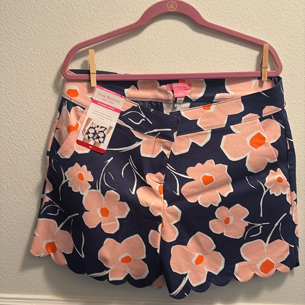 Isaac Mizrahi size 14 brand new (with tags) shorts. Color is a very dark blue.